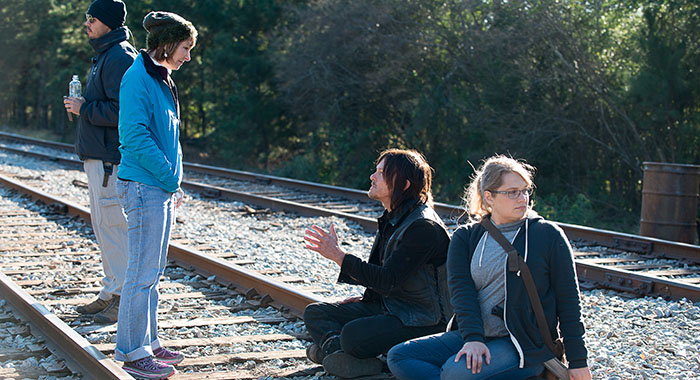 Executive Producer Gale Anne Hurd, Norman Reedus as Daryl Dixon, and Merritt Wever as Dr. Denise Cloyd - The Walking Dead - Season 6, Episode 14 (Gene Page/AMC)