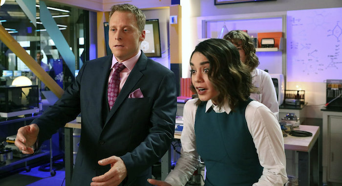 POWERLESS -- "Wayne Dream Team" Episode 103 -- Pictured: (l-r) Alan Tudyk as Van, Vanessa Hudgens as Emily -- (Photo by: Evans Vestal Ward/Warner Bros/NBC)