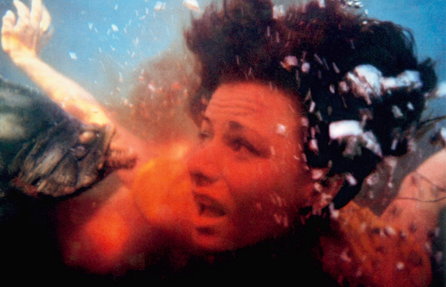 PIRANHA, Belinda Balaski, 1978. ©New World Pictures/Courtesy Everett Collection