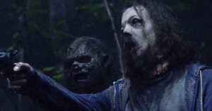 Whisperers Capture Team Daryl in an Exclusive Sneak Peek of <em>The Walking Dead</em>