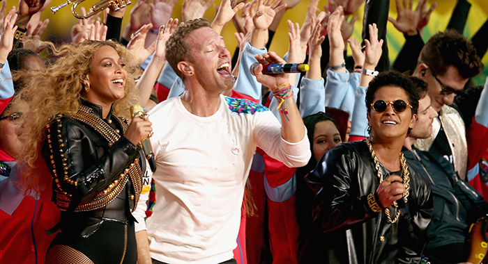 Beyonce, Chris Martin of Coldplay and Bruno Mars perform onstage during the Pepsi Super Bowl 50 Halftime Show 