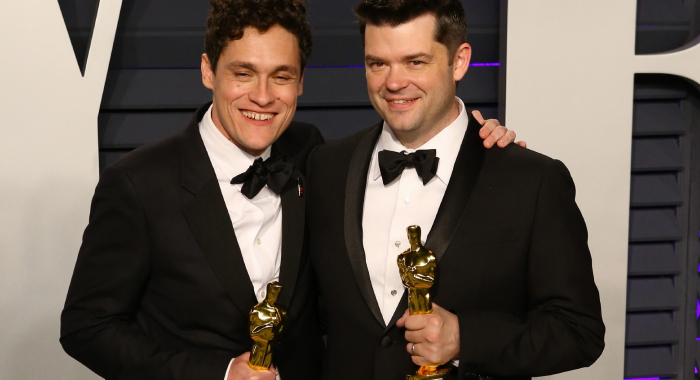 Phil Lord and Chris Miller at the 2019 Vanity Fair Oscar Party after winning the Best Animated Feature Oscar for Spider-Man: Into the Spider-Verse