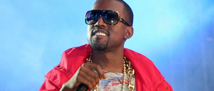 Kanye West performing on stage