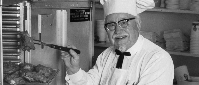 KFC founder Colonel Harland David Sanders cooking fried chicken in 1968