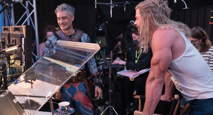 Taika Waititi and Chris Hemsworth behind the scenes on set of Thor: Love and Thunder