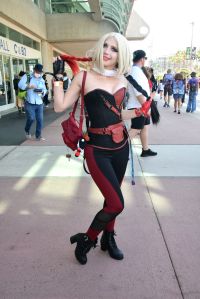 A cosplayer wears a Harley Quinn costume