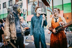 Cosplayers dressed as Jason, Michael Myers, and Leatherface