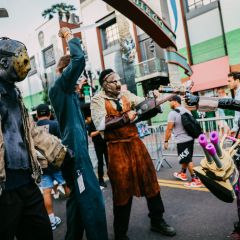 Cosplayer dressed as Jason, Michael Myers, and Leatherface