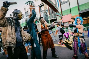 Cosplayer dressed as Jason, Michael Myers, and Leatherface
