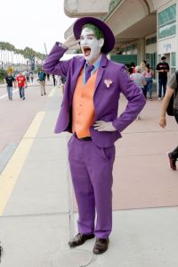 A cosplayer in character as The Joker