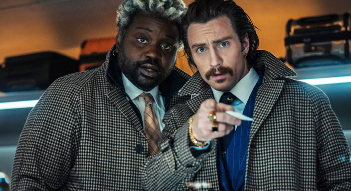 Brian Tyree Henry and Aaron Taylor-Johnson in Bullet Train (2022)