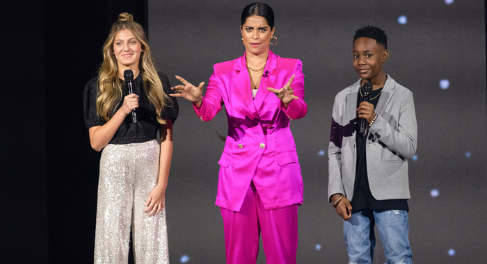 Emma Berman, Lilly Singh, and Jamaal Avery Jr. on stage at D23