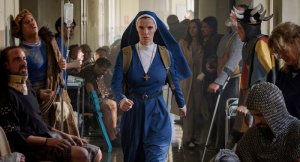 MRS. DAVIS -- "TBD" Episode 104 --Pictured: Betty Gilpin as Simone -- (Photo by: Sophie Kohler/PEACOCK)