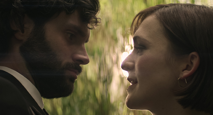 You. (L to R) Penn Badgley as Joe, Charlotte Ritchie as Kate in episode 403 of You. Cr. Courtesy of Netflix © 2022