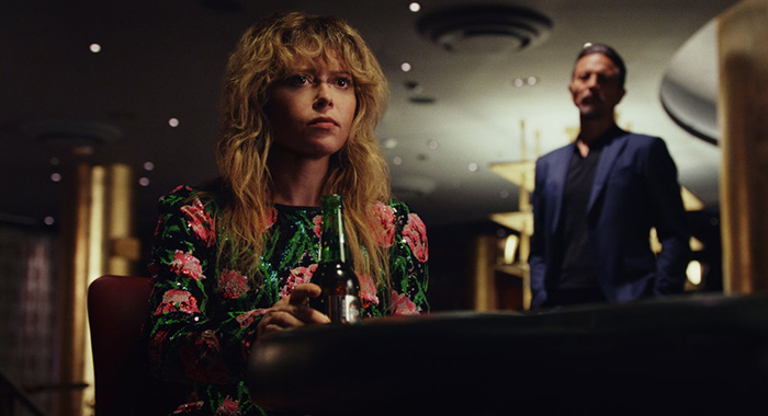 POKER FACE -- “The Hook” Episode 110 -- Pictured: (l-r) Natasha Lyonne as Charlie Cale, Benjamin Bratt as Cliff Legrand -- (Photo by: Peacock)