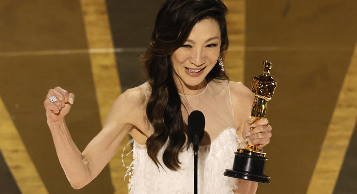 Michelle Yeoh accepts the Oscar for Best Actress at the 95th Academy Awards