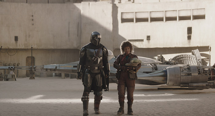 Pedro Pascal, Amy Sedaris, and Grogu in THE MANDALORIAN