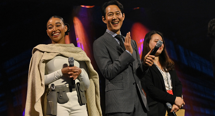 Amandla Stenberg and Lee Jung-jae onstage during the studio panel for The Acolyte at the Star Wars Celebration 2023