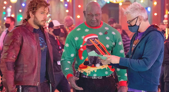 Chris Pratt as Peter Quill, Dave Bautista as Drax, and writer-director James Gunn on the set of The Guardians of the Galaxy Holiday Special (2022)