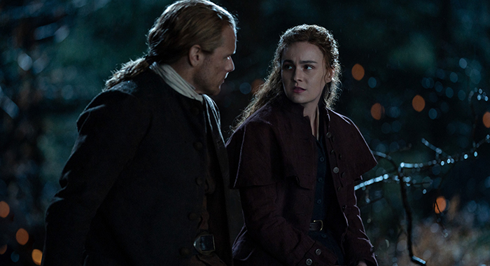 Sam Heughan as Jamie Fraser and Sophie Skelton as Brianna Fraser Mackenzie in <I>Outlander</i> on Starz.