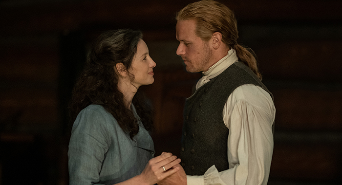 Caitríona Balfe as Claire Fraser and Sam Heughan as Jamie Fraser in <I>Outlander</i> on Starz.