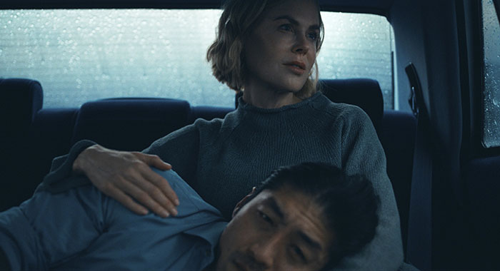 Clarke (Brian Tee), Margaret (Nicole Kidman) expats