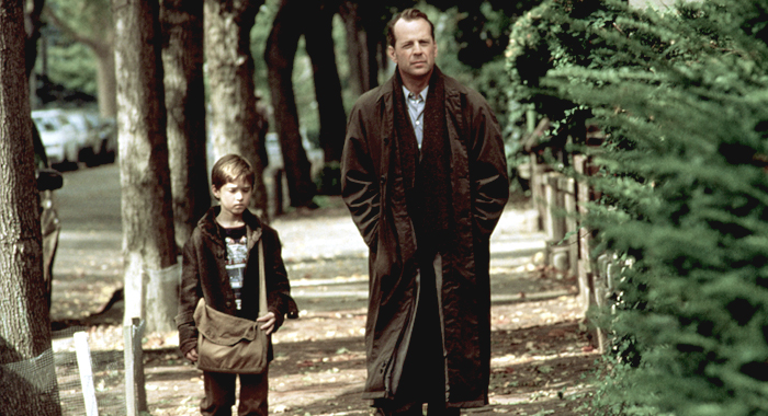 Haley Joel Osment and Bruce Willis in The Sixth Sense (1999)