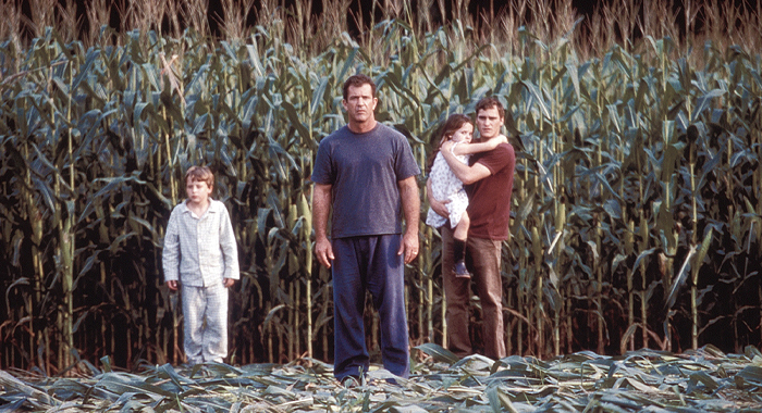 Rory Culkin, Mel Gibson, Abigail Breslin, and Joaquin Phoenix in Signs (2002)