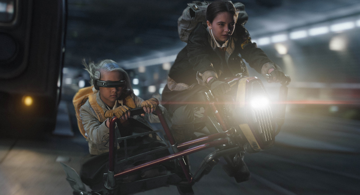 KB (Kyriana Kratter) and Fern (Ryan Kiera Armstrong) on hoverbikes in Lucasfilm's STAR WARS: SKELETON CREW