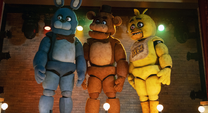 Bonnie (Jade Kindar-Martin), Freddy Fazbear (Kevin Foster), and Chica (Jess Weiss) in Five Nights at Freddy's (2023)