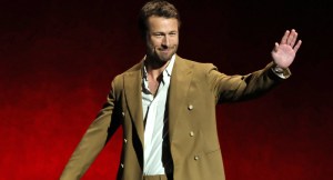 Glen Powell on stage at CinemaCon 2025 to present The Running Man (2025)
