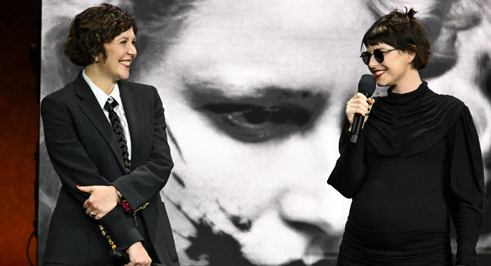 Maggie Gyllenhaal and Jessie Buckley on stage at CinemaCon 2025 to present The Bride! (2025)