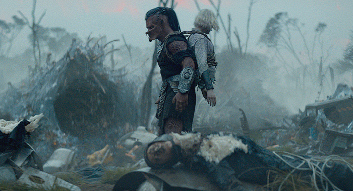 Elle Fanning and Dimitrius Schuster-Koloamatangi in Predator: Badlands (2025)