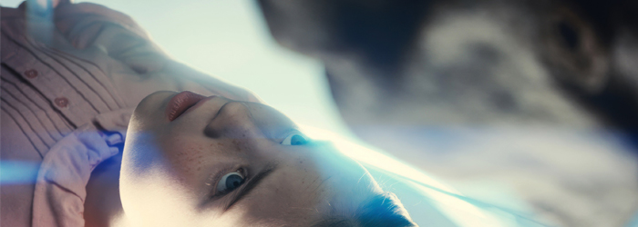 Girl staring at Alien