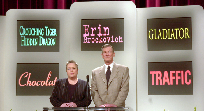 Kathy Bates and President of the Academy of Motion Picture Arts and Sciences, Robert Rehme, in front of the nominees for Best Picture