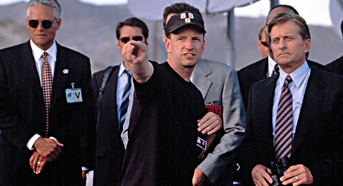 Director Steven Soderbergh and Michael Douglas on the set of Traffic (2000)